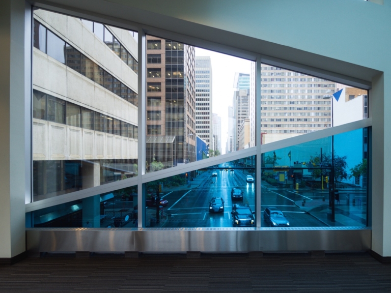 tinted office window looking onto street