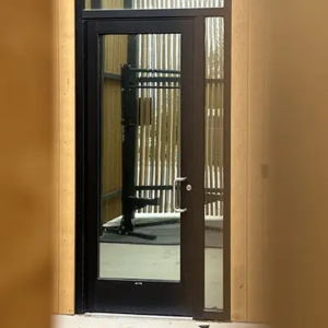 Exterior door on an office building with tinted glass