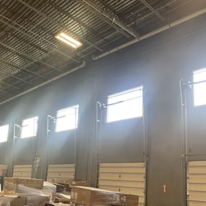 Windows above garage bays in a warehouse