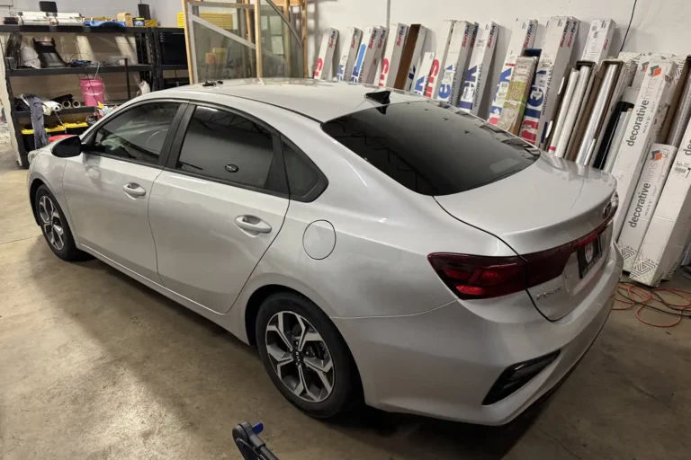 Window tint on a silver sedan